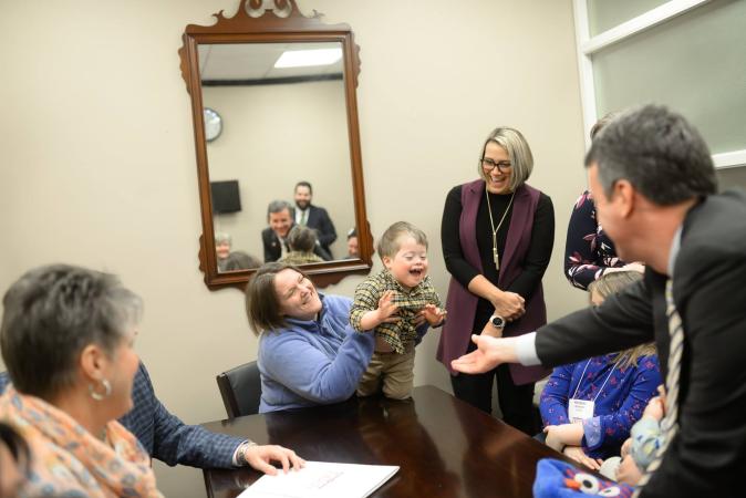 Group of advocates speaking with a Member of Congress